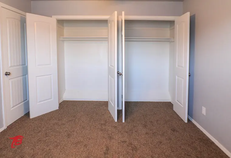 Bedroom with double closets